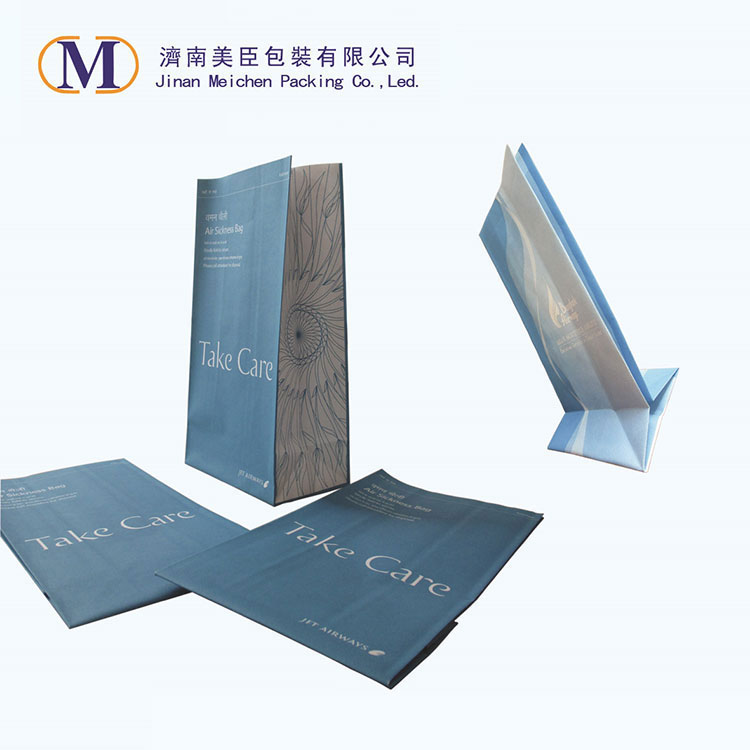 How does the square bottom of a block bottom airsickness bag enhance the stability of the bag and prevent tipping or leakage in a mobile environment?